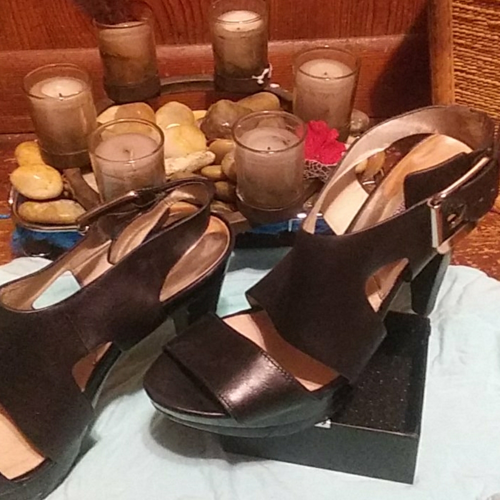 Michael Kors black strap heel. Size fits smaller